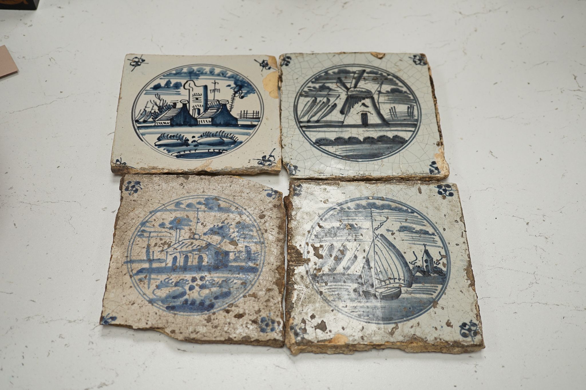 Eight various 18th and 19th century Delft tiles, 13cm
